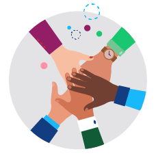 Many colleagues with their hands together in the center of a circle.